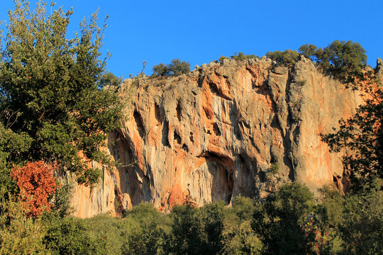 Rock climbing crag area in Geyikbayiri, Turkey. Rock climbing spot near Antalya. Geyikbayiri rockclimbing area crag in Turkey. Tuffa rock walls and caves spectacular view landscape Spectacular Cave