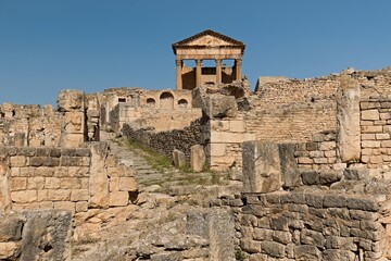 Ruins of the Capitol in the ancient Roman city of Dougga (Thugga). Today a UNESCO World Heritage Site Tunisia. Africa.