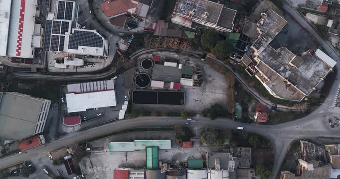 Aerial view of tanning factory buildings and roads, showcasing urban planning and infrastructure, with a mix of residential and commercial properties, Solofra, Campania, Italy.