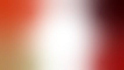 a blurry image with a black center and red and orange gradient background