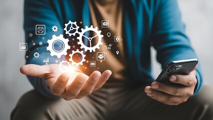 Businessman interacting with digital gears and icons on smartphone