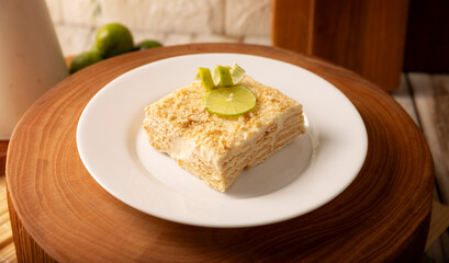 Carlota de Limon, a cold, no-bake dessert made with layers of Maria cookies and a creamy mixture of lemon and condensed milk, an easy homemade recipe very popular in Mexico.