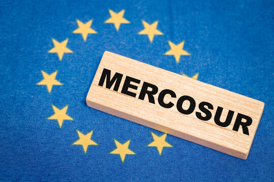 The flag of the European Union and the word Mercosur in the background. A financial and business concept. A trade agreement between the countries of the South and the European Union.