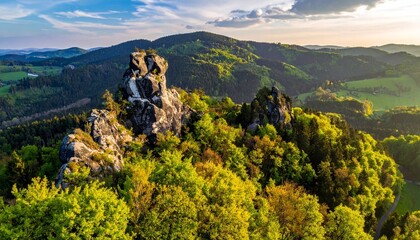 Spring Meadow and Rocky Hill at Sunrise Symbolizing Natural Beauty and Editorial Styling for Landscape Travel