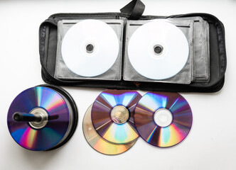 Bunch of CD and DVD discs organized in a disc holder.