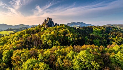 Spring Meadow and Rocky Hill at Sunrise Symbolizing Natural Beauty and Editorial Styling for Landscape Travel