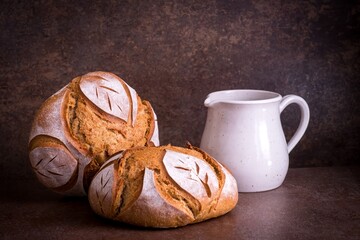 Background with two breads from wheat flour	
