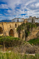 Obraz premium Exploring the majestic Puente Nuevo bridge in Ronda, Spain, at sunrise