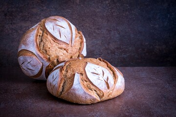 Background with two breads from wheat flour	