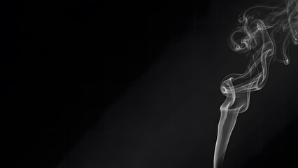 Smoke rising softly against a dark background in a simple indoor setting during daylight hours