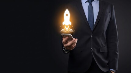 Businessman in suit holding smartphone with launching rocket icon on screen, symbolizing startup success and innovation