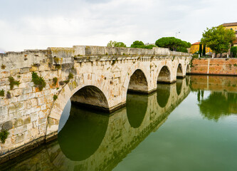 Tiberius Bridge over the river in Rimini. Italian classical architecture. A city landmark. Italy building