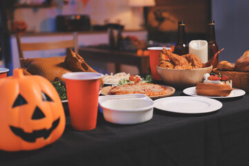Friends enjoying a Halloween party at a bar making a toast