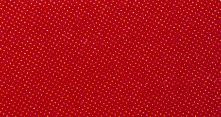 Macro close-up of a red printed paper surface with halftone dot pattern, grain and grunge noise. Abstract vintage print texture background for design, overlays and motion graphics. - Powered by Adobe