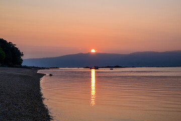 Ca&iacute;da del sol sobre el horizonte