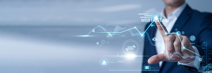 Systems administrator pointing at data network and Web Hosting on digital interface. Cloud server...