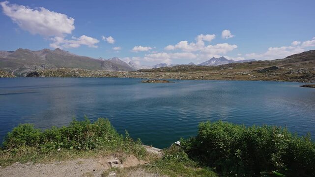 Blue Alpine Lake and Mountain Panorama at Grimsel Pass.Filmed on 30 July 2025.