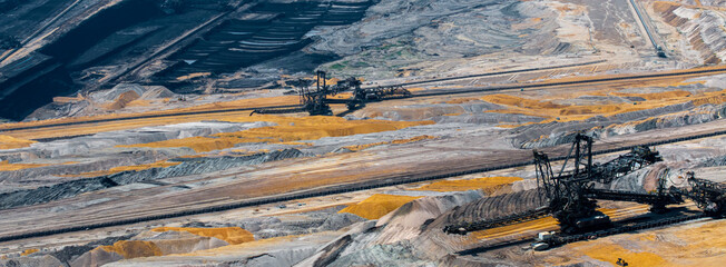 a open coal mine and modern bucket wheel excavator panorama © Tobias Arhelger