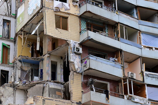 Russian missile strike on apartment building in Dnipro, Ukraine. Rocket destroyed house. Russia war invasion in Ukraine, Destroyed building