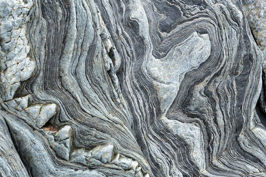 Natural rock texture with layered geological patterns