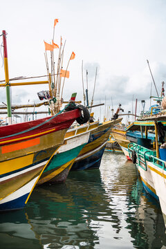Colorful fishing boats docked at Colombo port