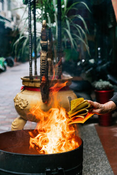 Burning joss paper in a traditional Taiwanese ritual