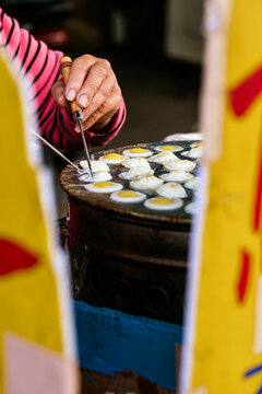 Street vendor cooking quail eggs in Taiwan