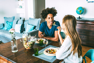 Couple enjoying a meal together at home