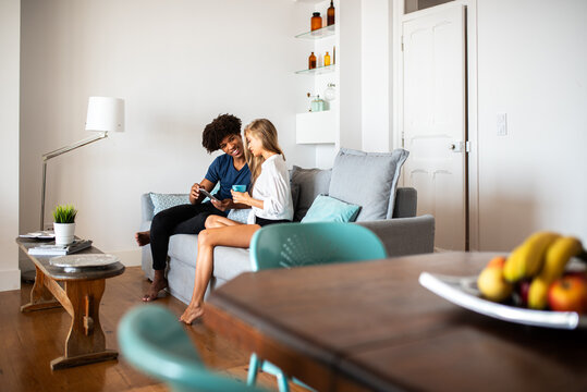 Happy multiethnic couple enjoying time at home