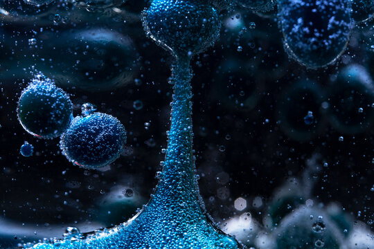 Abstract blue bubbles in artistic liquid atmosphere