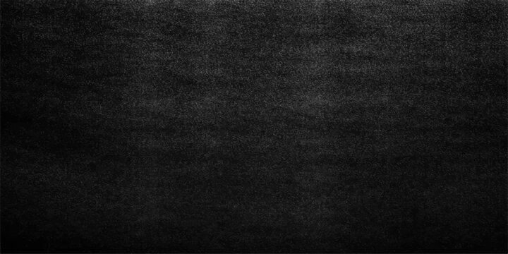 A closeup of a dark black leather and denim fabric textile with a rough grunge pattern on a textured material surface for a cloth wallpaper backdrop