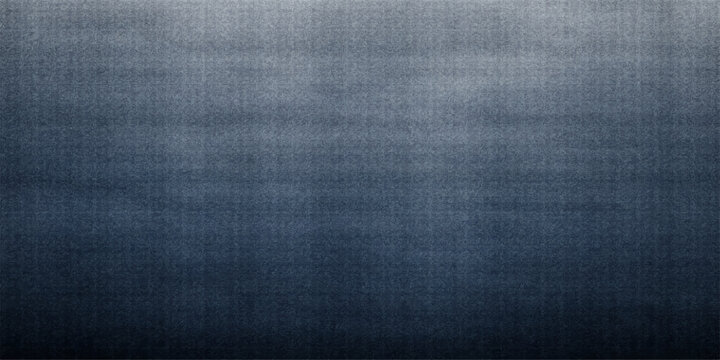 A dark blue denim fabric texture exhibits a rough, macro cotton textile pattern on a grunge clothing material surface, creating a classic fashion backdrop with an old, textured linen feel