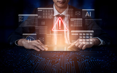 A businessman reviews data on a tablet, with a digital alert symbol indicating potential risks. This image highlights the importance of cybersecurity in today business landscape. Gantry