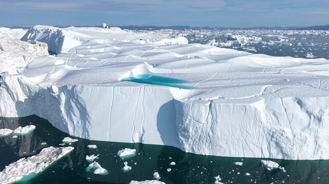 GREENLAND - 11.4.2025 - Beautiful aerial footage passing over an ice field in Greenland.