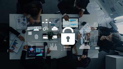 Business Team Collaborating on Data Security Solutions with Digital Lock Icon and Analytics Charts in Modern Office Setting Trope.
