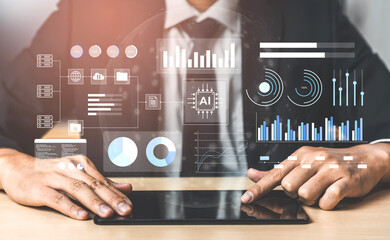 Businessman engaged in data analysis using a digital tablet, displaying various graphical insights and financial metrics in a modern office setting. Gantry