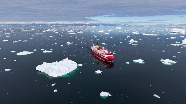 GREENLAND - 11.4.2025 - Amazing aerial footage of a ship sailing through Greenland's Disko Bay.