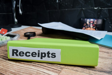 Folders with the label receipts. Business management concept