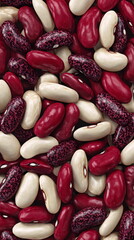 Red white and speckled beans arranged as seamless food background