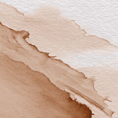 Watercolor texture with brown paint stains on paper surface