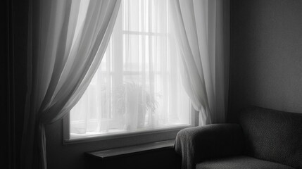 Black and white photograph of a window with sheer white curtains. the window is open and the curtains are billowing in the wind. the curtains are open, allowing natural light to enter the room.