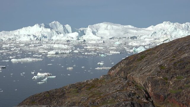 GREENLAND - 11.4.2025 - Good aerial timelapse of ice floes moving down Greenland's Disko Bay.