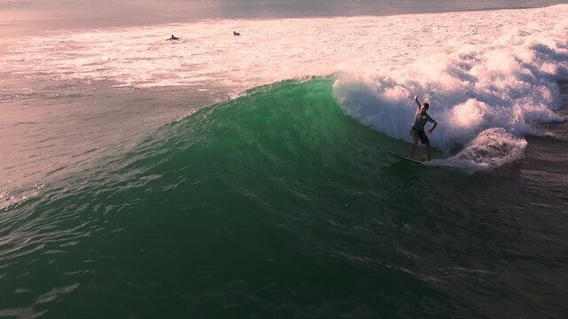Emerald Wave Pro Surfer Carving Hard, Aerial Chase By Drone, Fast Turns And Rail Snaps, Explosive Spray