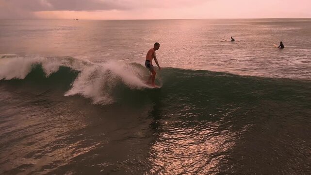 Sunset Longboarder Smooth Nose Ride, Mellow Golden Light On Calm Glassy Ocean, Reflective Horizon And Gentle