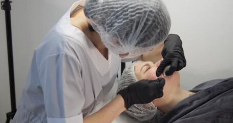 Cosmetic procedures for problematic facial skin in teenagers. Skin cleansing and acne removal.