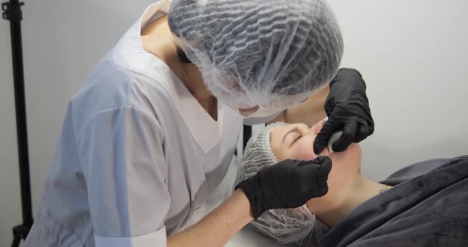 Cosmetic procedures for problematic facial skin in teenagers. Skin cleansing and acne removal.