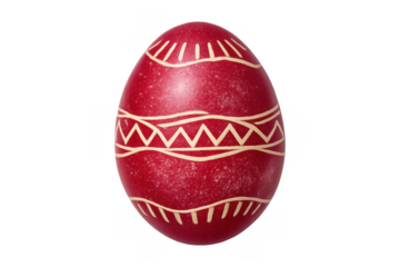 Red traditional pysanka easter egg with wax-resist pattern
