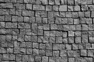 Seamless gray cobblestone wall or road texture background empty grey decorative stone tile top aerial view. street urban square tiled floor flooring as backdrop background. nobody wall texture pattern