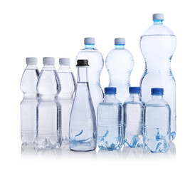 Naklejka premium Water bottles of different sizes isolated on white