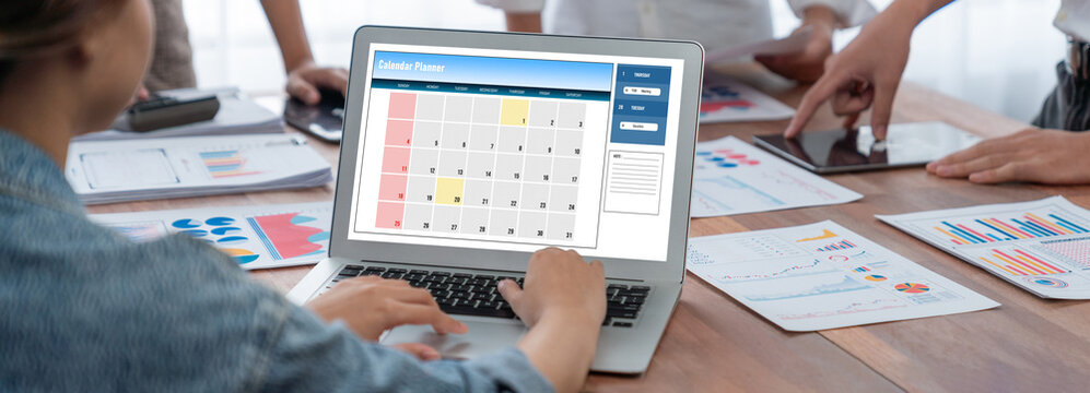 Calendar on computer software application for brisk schedule planning for personal organizer and online business - Powered by Adobe